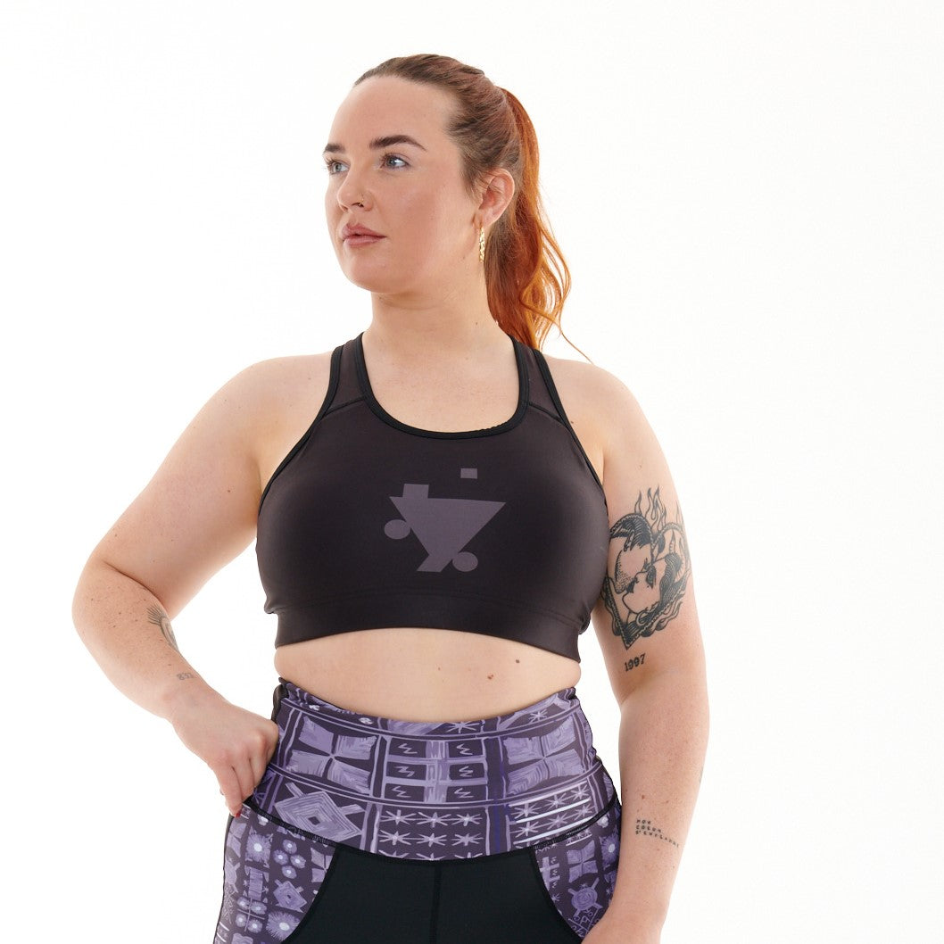 White Oliver B.G.W.E sports bra, activewear top with supportive design, shown on a mannequin.
