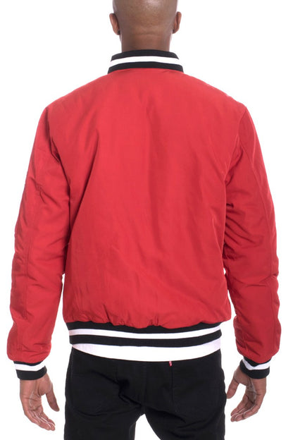 Lime Milo Luxe Twill Jacket in red, shown from the back with tailored fit and stylish collar detail.