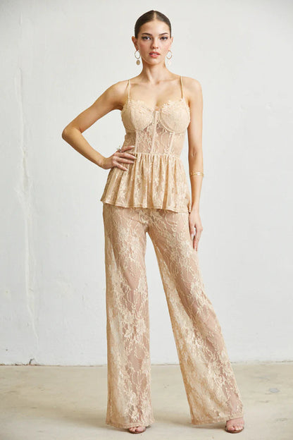 White Amphitryon Queeny sleeveless spaghetti strap evening dress jumpsuit with fitted bodice and flowing leg design.