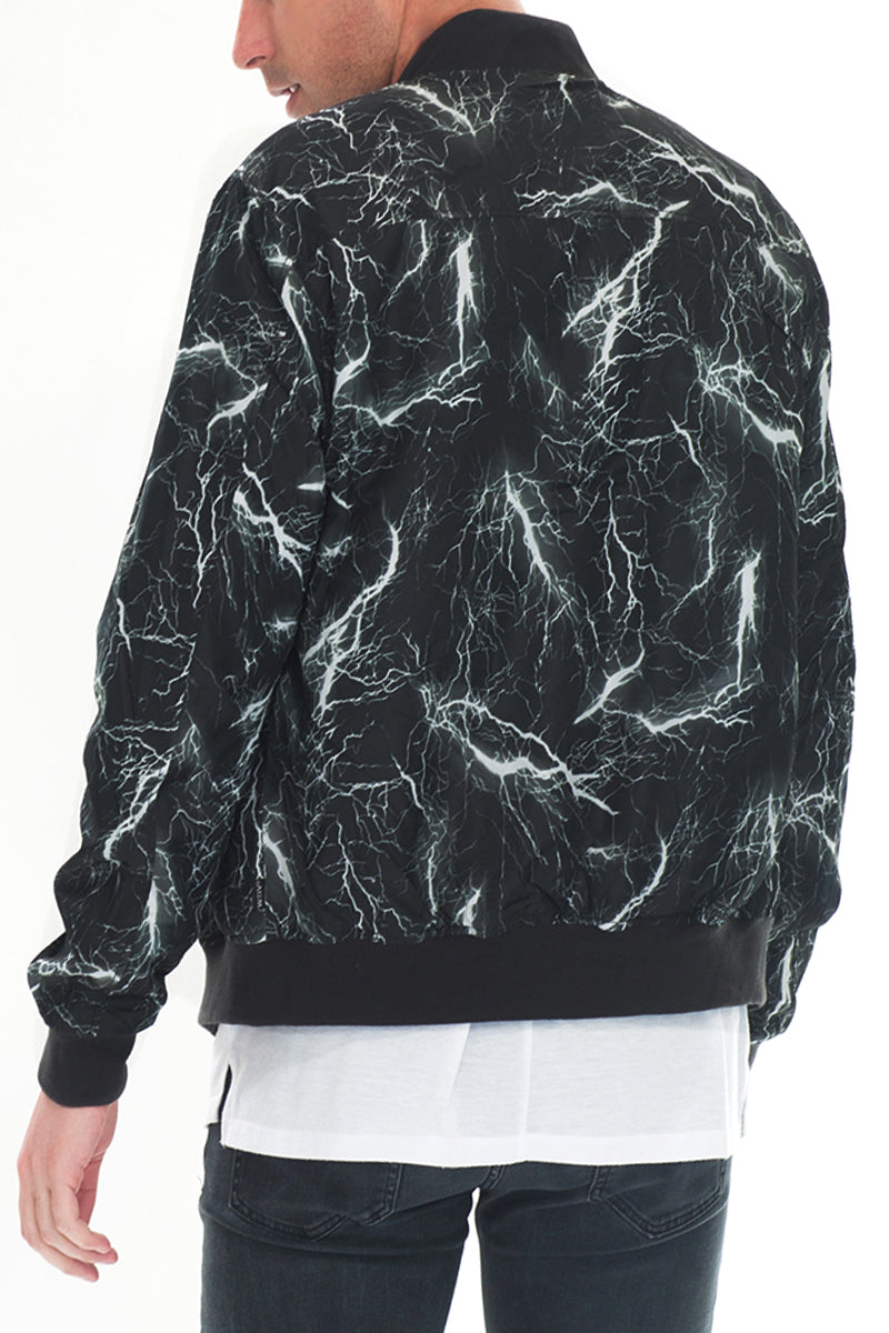 Lime Milo Bolt Print Bomber jacket featuring a bold graphic design and classic bomber style, displayed on a hanger.