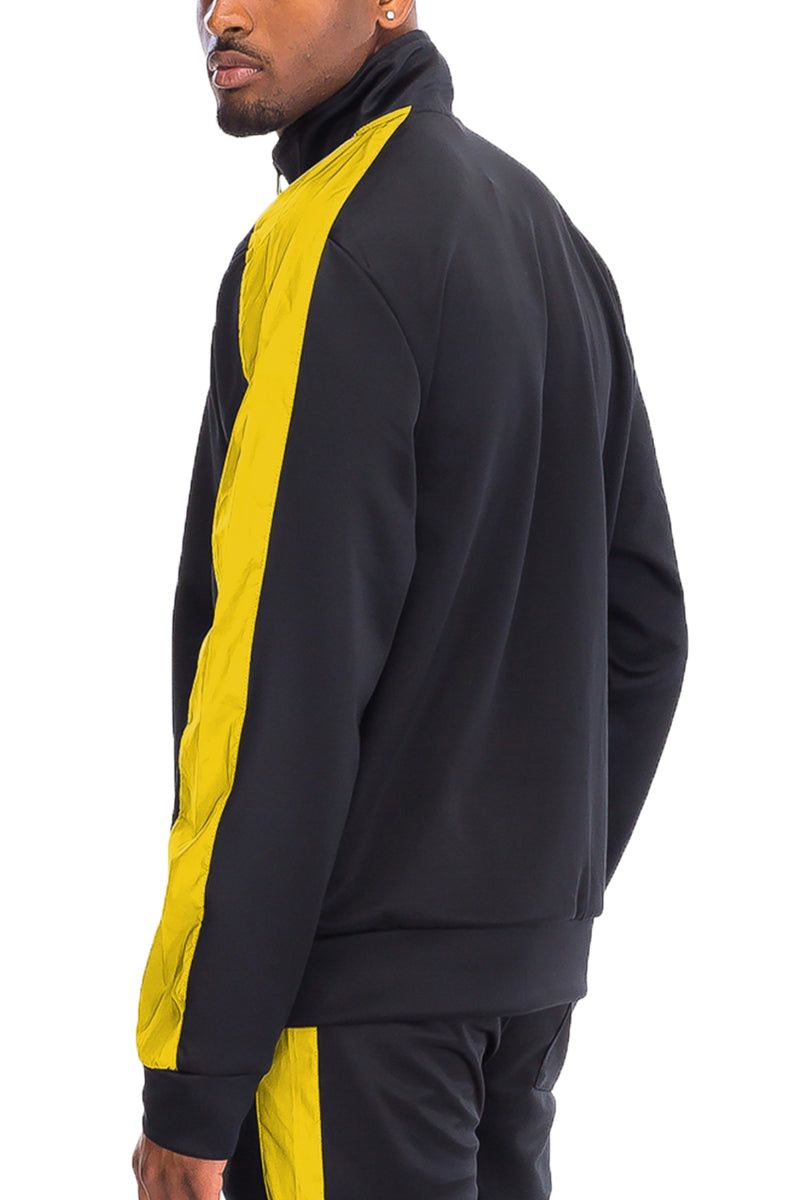 Lime Milo single stripe track jacket TJ123, black color, with sporty design and zipper front, displayed on a hanger.