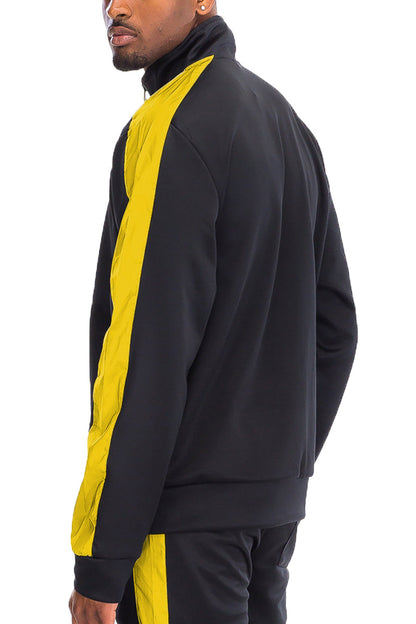 Lime Milo single stripe track jacket TJ123, black color, with sporty design and zipper front, displayed on a hanger.