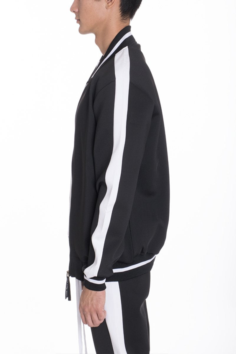 Lime Milo heavy weight solid black track jacket for activewear, featuring a full zip and ribbed cuffs.