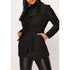 Black belted waterfall coat for women by Azure Theseus, featuring a stylish draped design and fitted waist with belt.