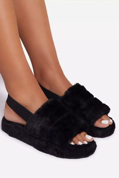 Black faux fur fluffy stripe slippers for women by Azure Theseus, featuring cozy, plush material and stylish striped design.