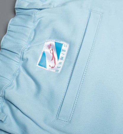 Blue cotton swimwear shorts by Ruby Tartarus featuring a comfortable fit and casual style, shown on a model.