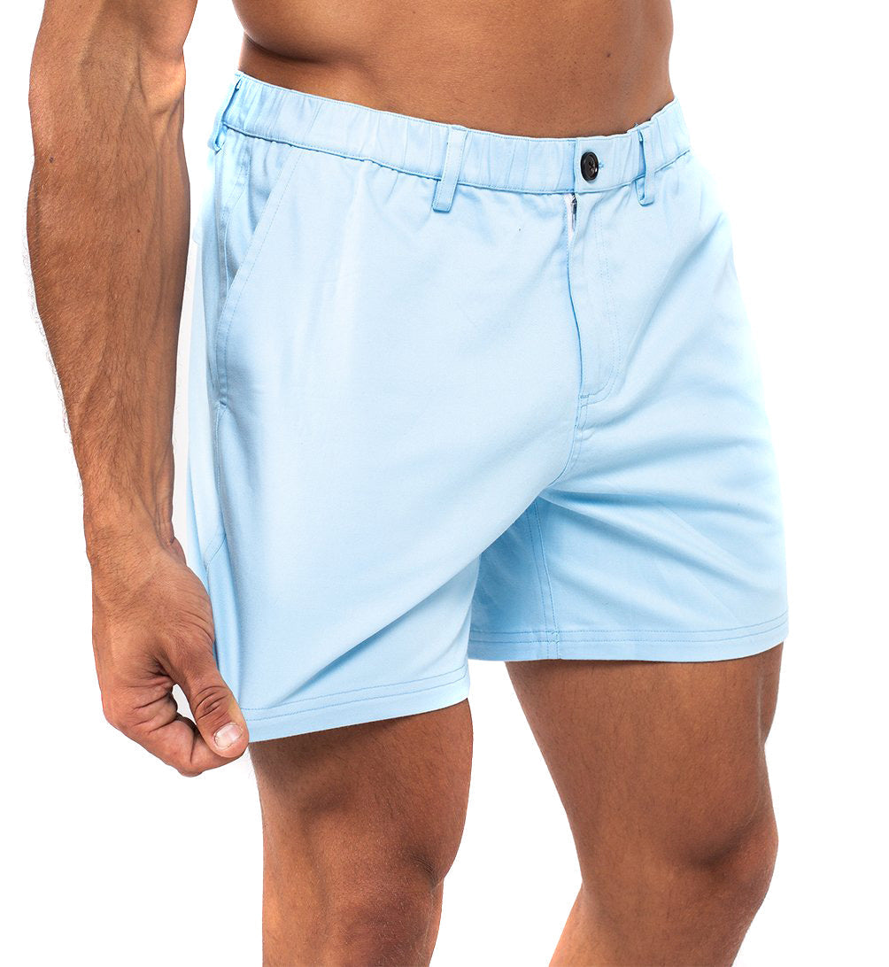 Blue cotton swim shorts by Ruby Tartarus featuring a relaxed fit and casual style, suitable for beach or poolside wear.