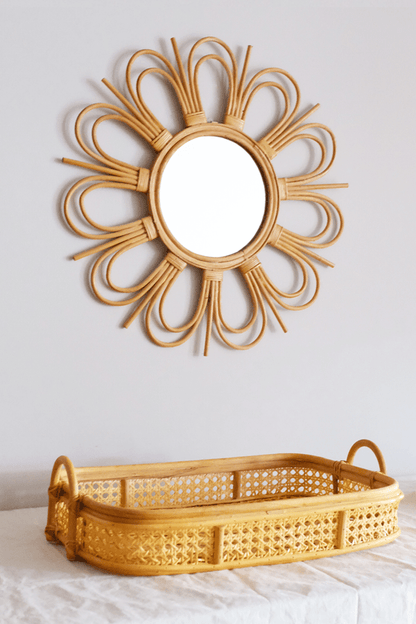 Start2Finish flower rattan mirror with round frame and intricate woven design, suitable for modern or bohemian decor.