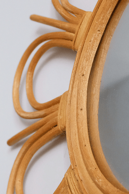 Start2Finish rattan flower-shaped mirror with a round frame, decorative and stylish wall decor for living spaces.