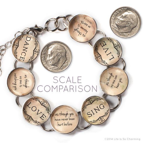 Glass charm bracelet by Orchid Briseis featuring a heart-shaped pendant with "Dance, Love, Sing, Live" inscription.