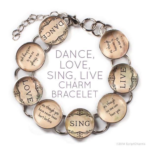 Glass charm bracelet by Orchid Briseis featuring a heart charm with dance, love, sing, live inscription on a sleek bracelet.