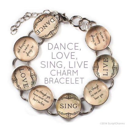 Glass charm bracelet by Orchid Briseis featuring a heart charm with dance, love, sing, live inscription on a sleek bracelet.