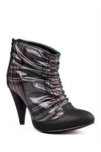 Azure Ophion BRINDAL footwear showing stylish design and comfortable fit in a natural outdoor setting.