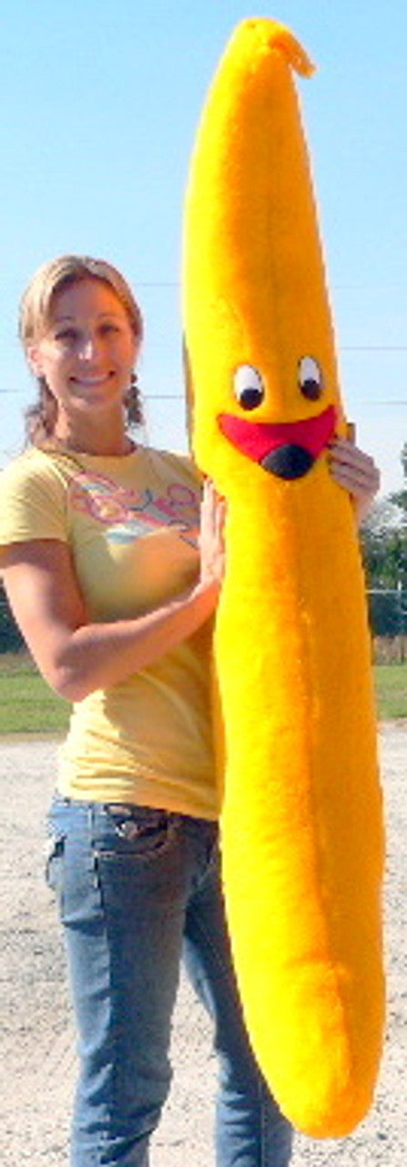 Large Ultramarine Eros giant plush banana, 5 feet tall, soft and cuddly gift, featuring bright yellow fabric and realistic banana shape.