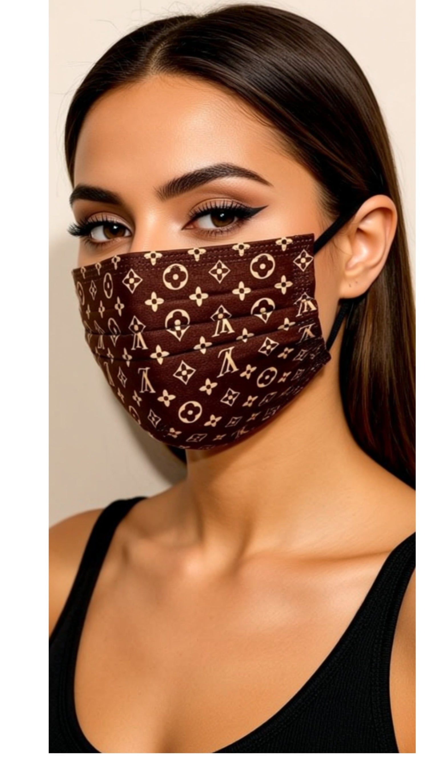 Fuchsia Erebus face mask designed as a stylish handbag with a vibrant pink exterior and elegant handle details.
