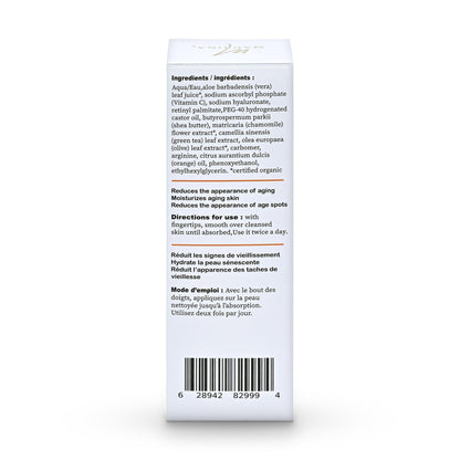 Orchid Zeus Vitamin C face serum with hyaluronic acid and retinol, showing a dropper bottle and fresh citrus slices.