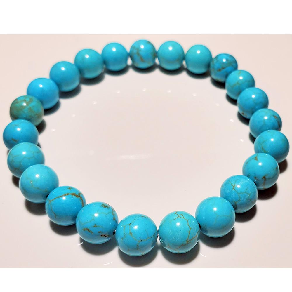 Blue Howlite beaded elastic stretch bracelet by Silver Hestia, featuring 8mm smooth blue stones for stylish jewelry.