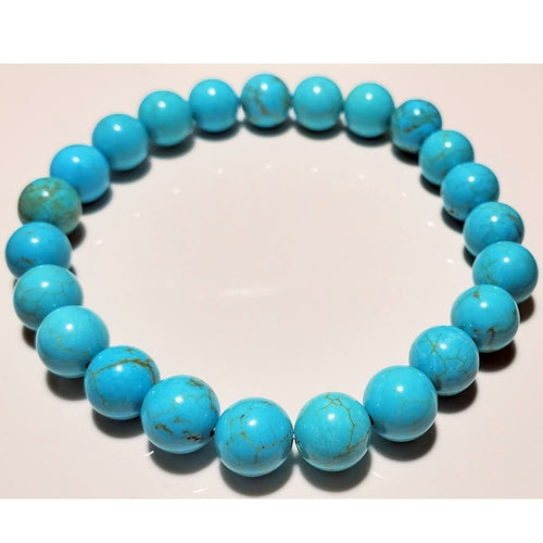 Blue howlite beaded elastic stretch bracelet featuring 8mm round beads, crafted by Silver Hestia, for stylish jewelry accessories.