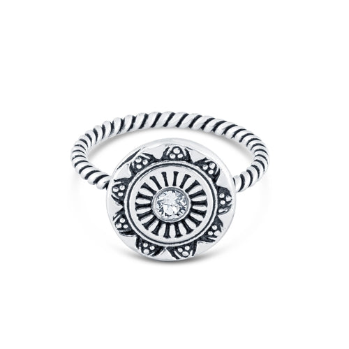 Cyan Ismene Bohemian Glam Ring with crystal accents, featuring intricate design and boho style, worn on a finger.