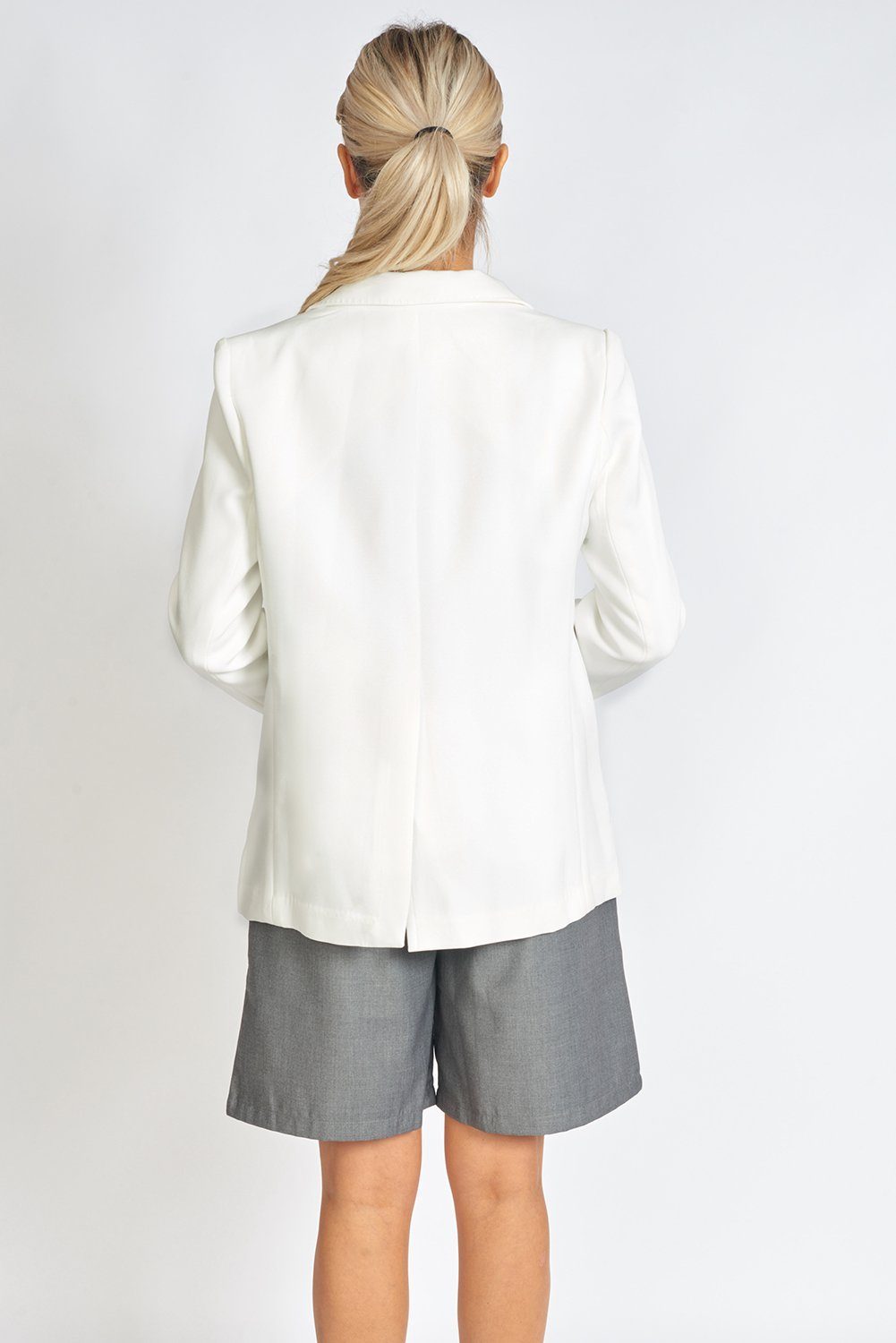Azure Thanatos Boss Babe oversized blazer shown on a model, stylish women&
