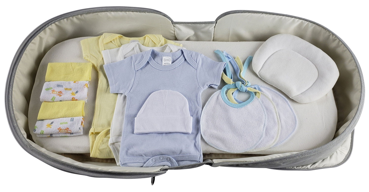 Boys 12-piece baby clothing starter set by Emerald Clover, includes onesies, shirts, pants, and a diaper bag for infants.