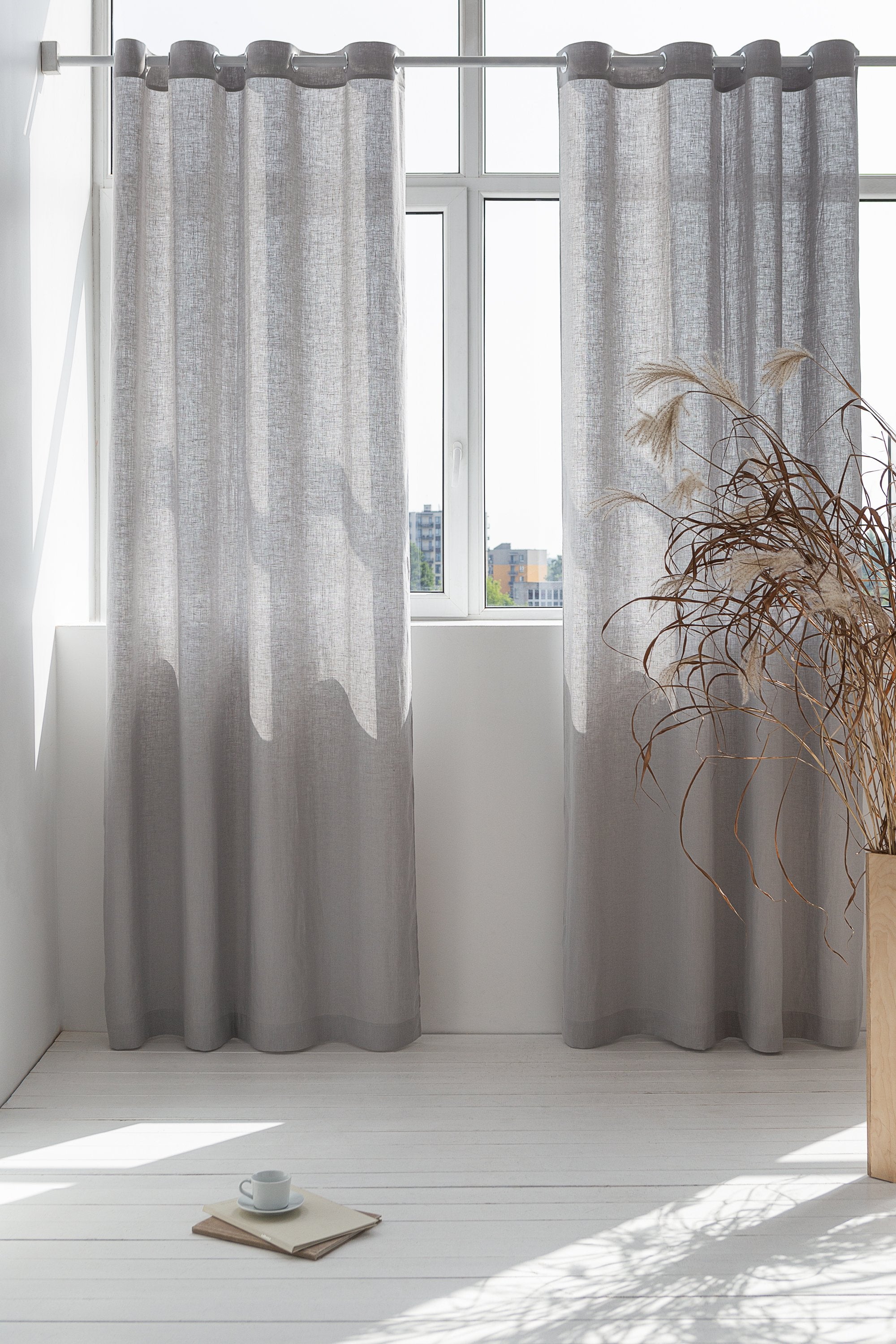 Light grey linen curtain with grommets from Magenta Sugarplum, perfect for stylish home decor and window treatment.