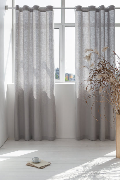Light grey linen curtain with grommets from Magenta Sugarplum, perfect for stylish home decor and window treatment.