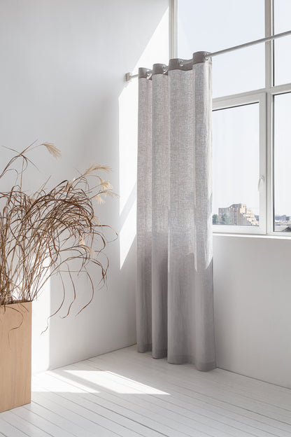 Light grey linen curtain with grommets by Magenta Sugarplum, showing smooth fabric and metal grommet details for home decor.