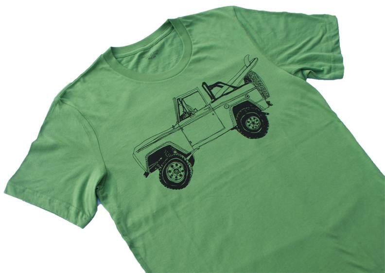 Pink Simba Bronco Surf Trip Leaf Green T-shirt with palm leaf design, casual fit, and vibrant green color.