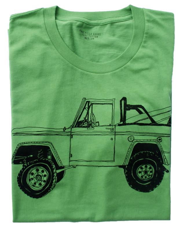 Pink Simba Bronco Surf Trip Leaf Green T-shirt with a casual fit and surf-inspired design, displayed on a white background.