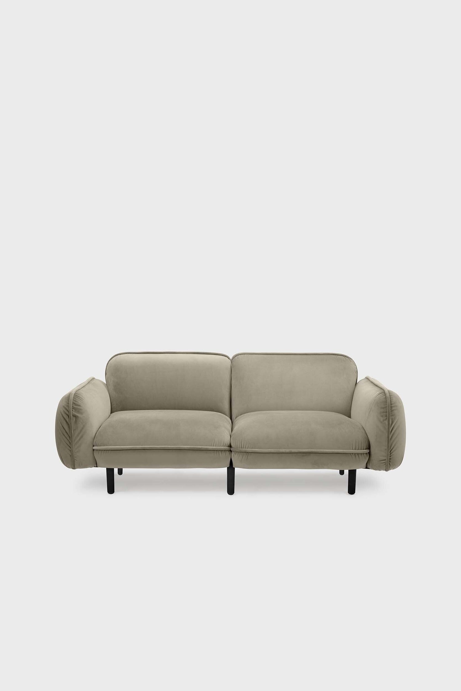Beige Bean Sofa by Aquamarine Poppy featuring plush cushions and modern furniture design in a stylish living room setting