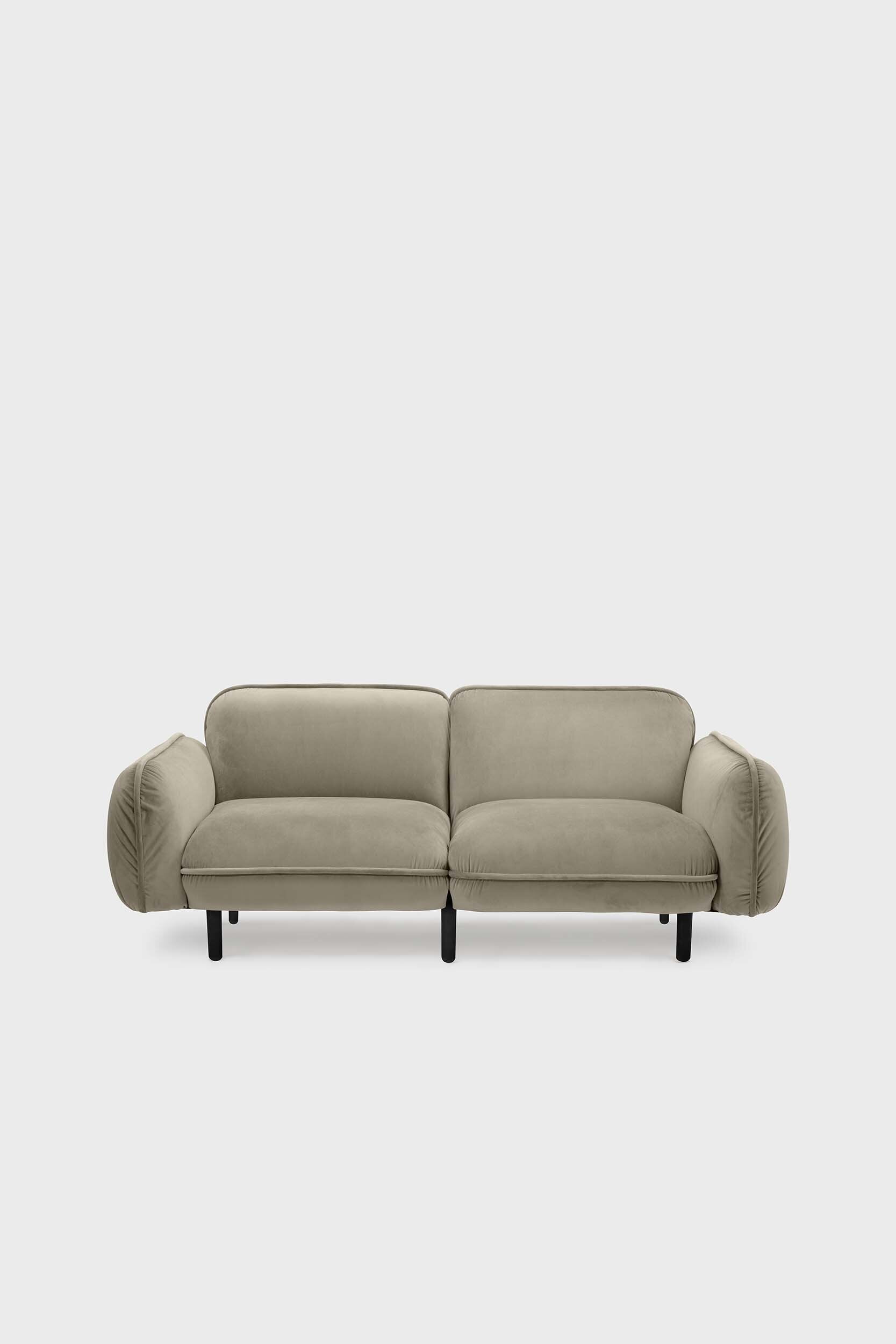 Beige Bean Sofa by Aquamarine Poppy featuring plush cushions and modern furniture design in a stylish living room setting