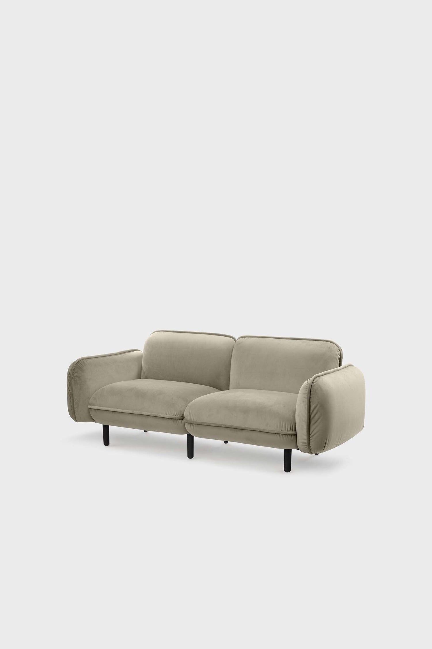Beige bean sofa by Aquamarine Poppy showing plush fabric cushions and modern furniture design.