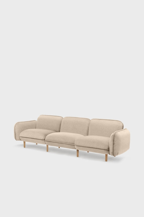 Aquamarine Poppy beige bean sofa with plush cushions and modern design, perfect for contemporary living rooms.