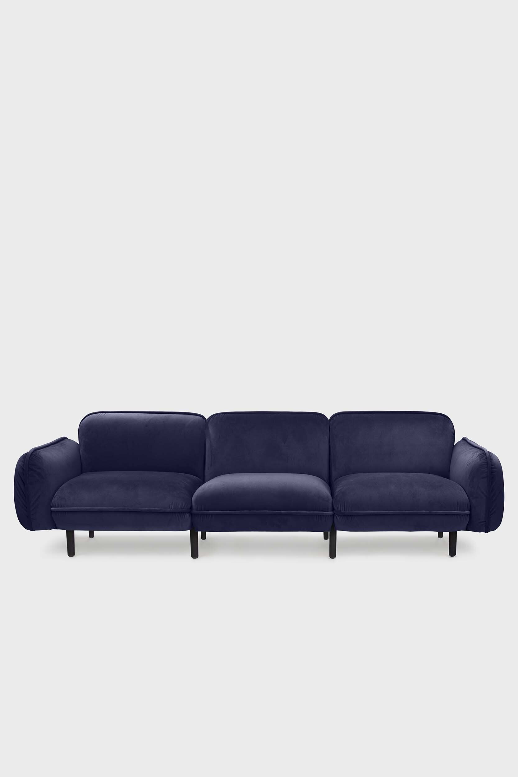 Blue Aquamarine Poppy Bean Sofa with plush fabric and modern design, shown in a cozy living room setting.