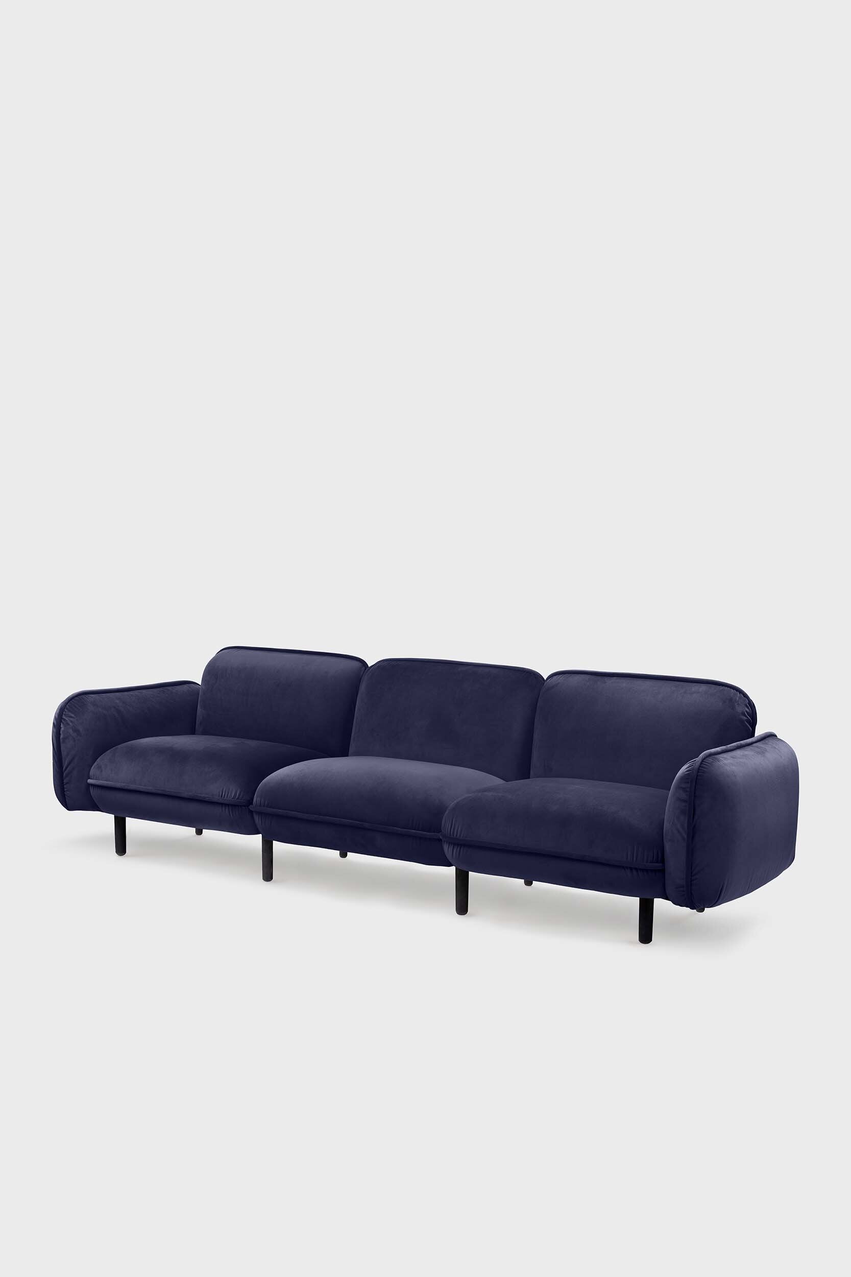 Blue Aquamarine Poppy Bean Sofa with plush fabric and modern design, shown in a cozy living room setting.