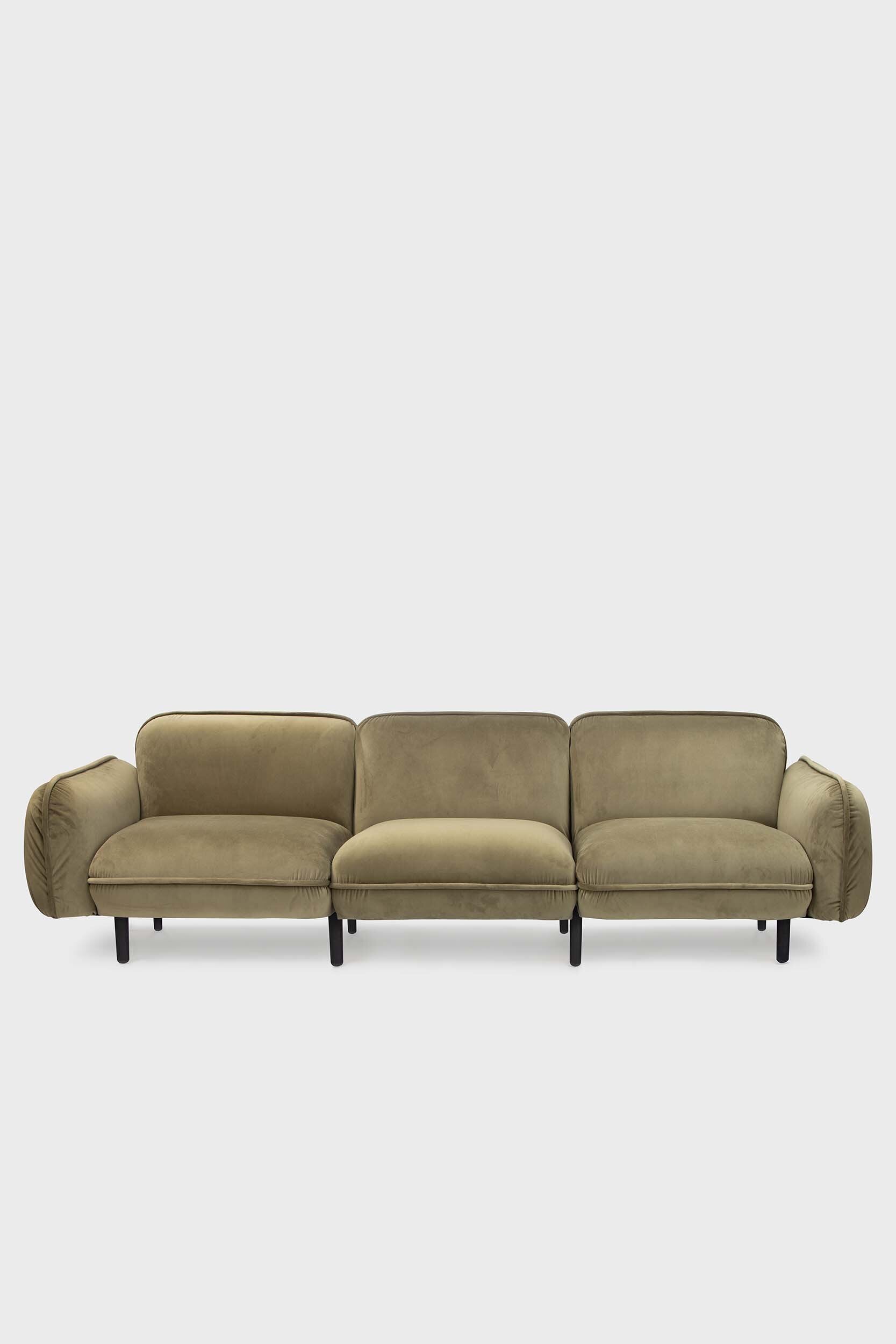 Aquamarine Poppy Bean Sofa in green fabric, showcasing its plush cushions and modern furniture design.