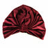 Burgundy stretch velvet turban by Cyan Ismene, a stylish haircare accessory with a full wrap design for comfortable wear.