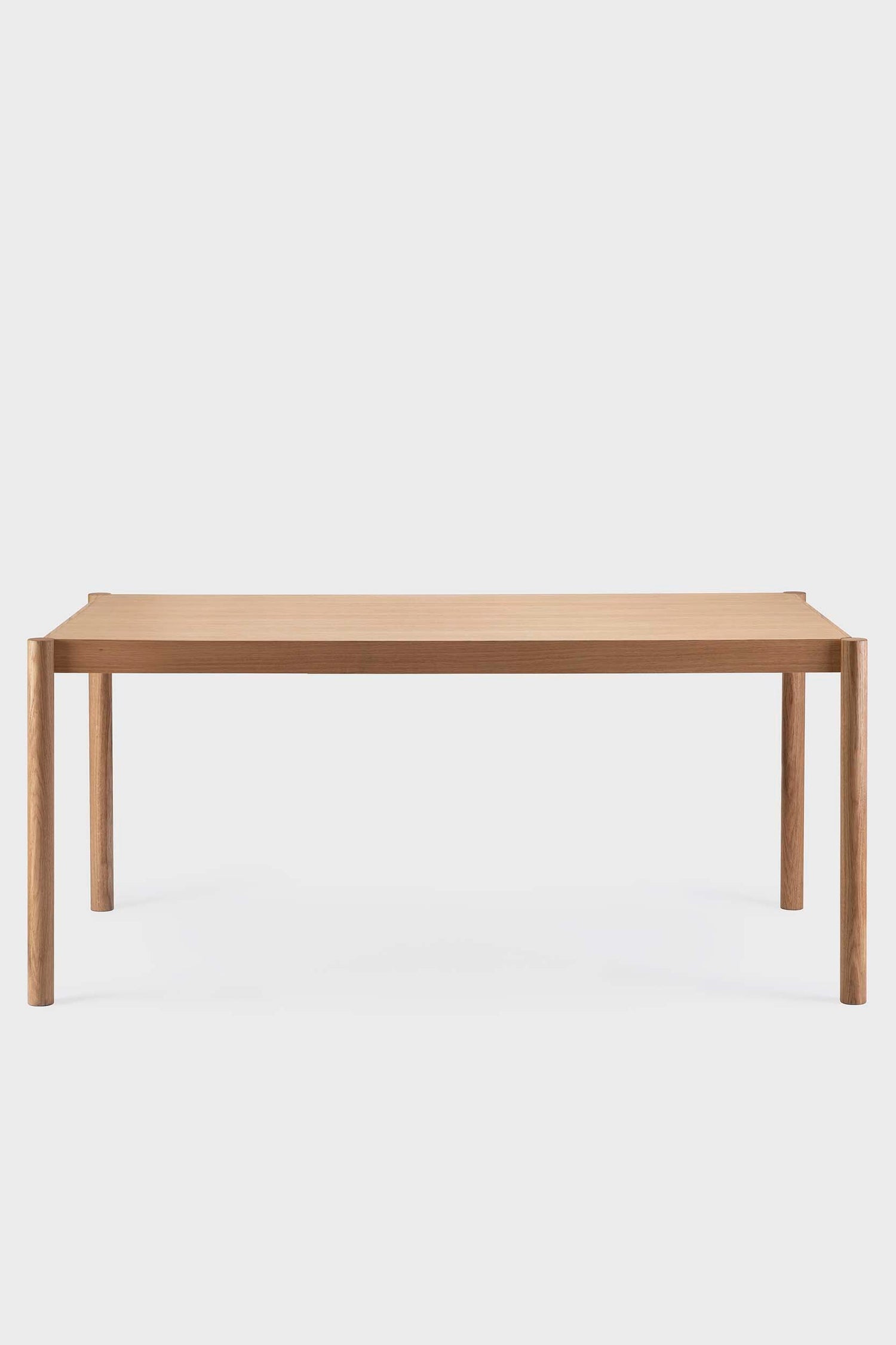 Natural wood Citizen dining table by Aquamarine Poppy, showcasing a modern furniture design with a smooth tabletop and sturdy legs.