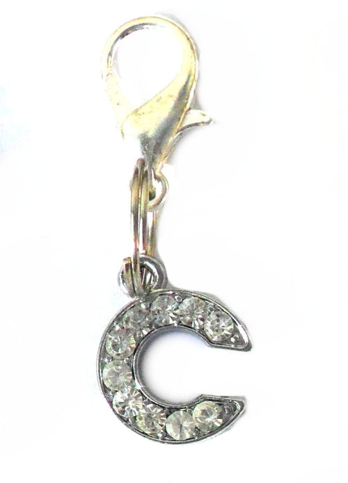 Salmon Oscar A-Z Crystal Letter pet charm attached to a colorful pet collar, showcasing sparkling crystal letter decoration.