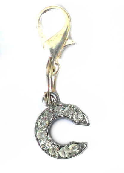 Salmon Oscar A-Z Crystal Letter pet charm attached to a colorful pet collar, showcasing sparkling crystal letter decoration.