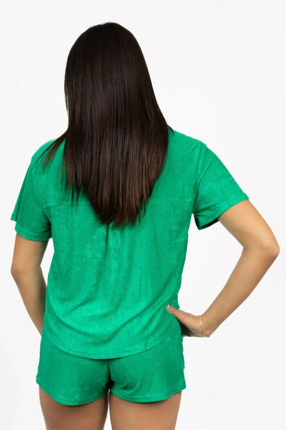 Pets wearing Burgundy Perses Cabana Green Terry Shorts, comfortable pet cover-up made of soft, green terry fabric.