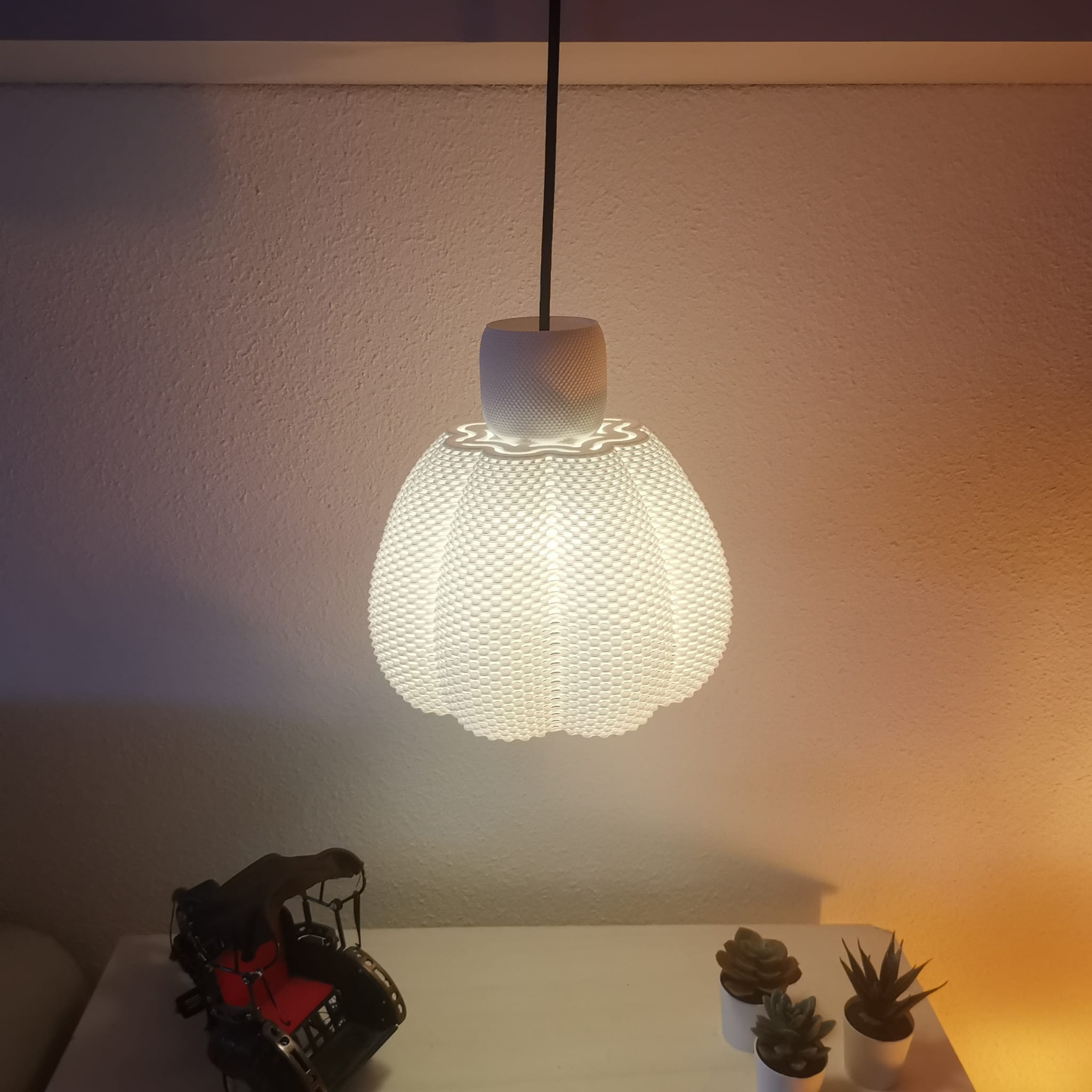 Azure Pontus Celeste Light Pendant Lamp hanging fixture with a sleek, modern design and soft glowing illumination.