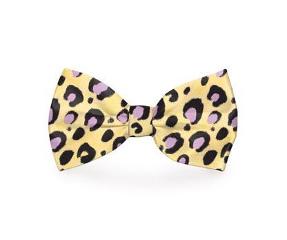 Yellow cheetah print dog bow tie from Plum Semele, stylish pet accessory for collars and petwear.
