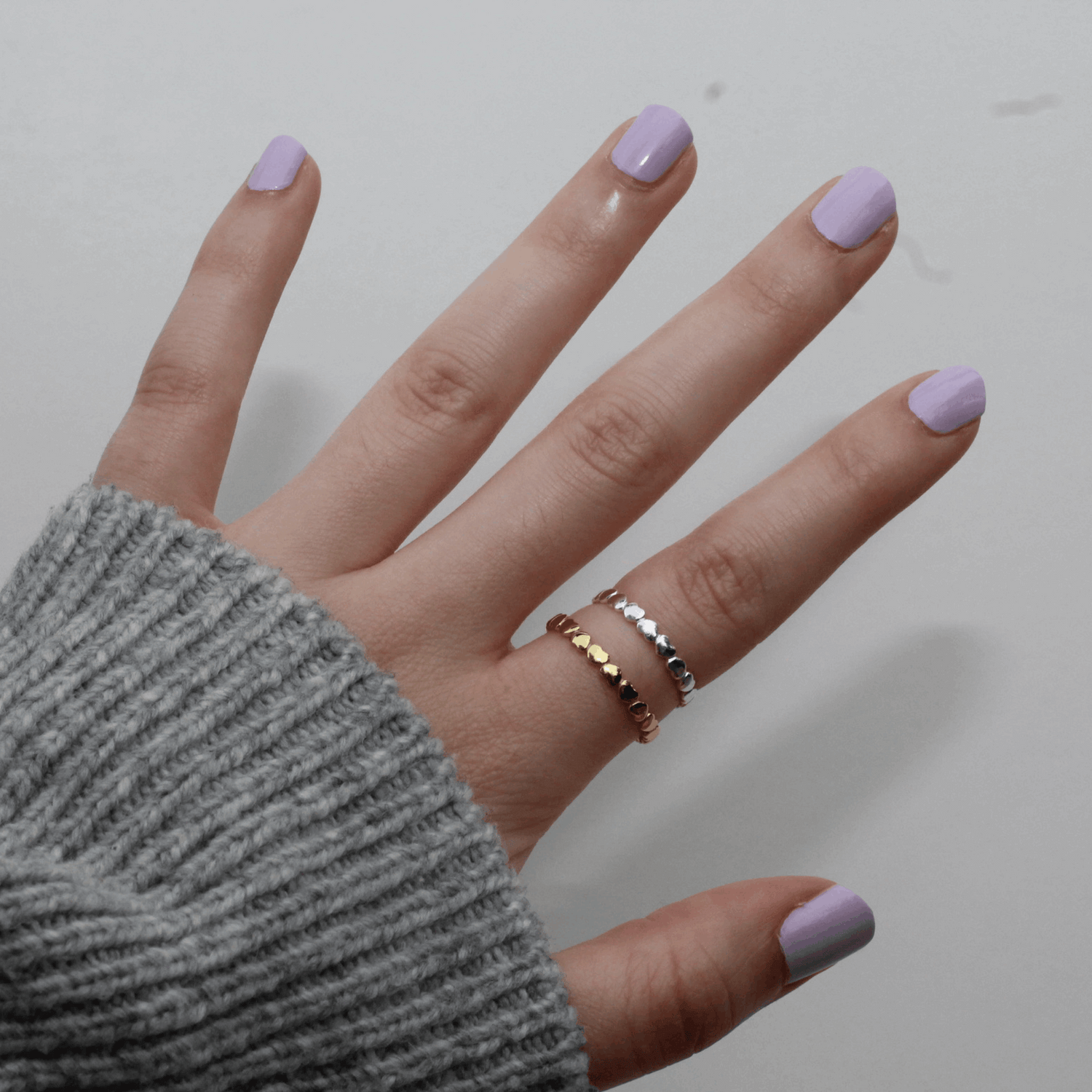 Cerise Poppy Circle of Love ring on a person&