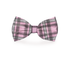 Pink plaid dog bow tie by Plum Semele, stylish petwear accessory for dogs, shown on a mockup with a classic pattern.