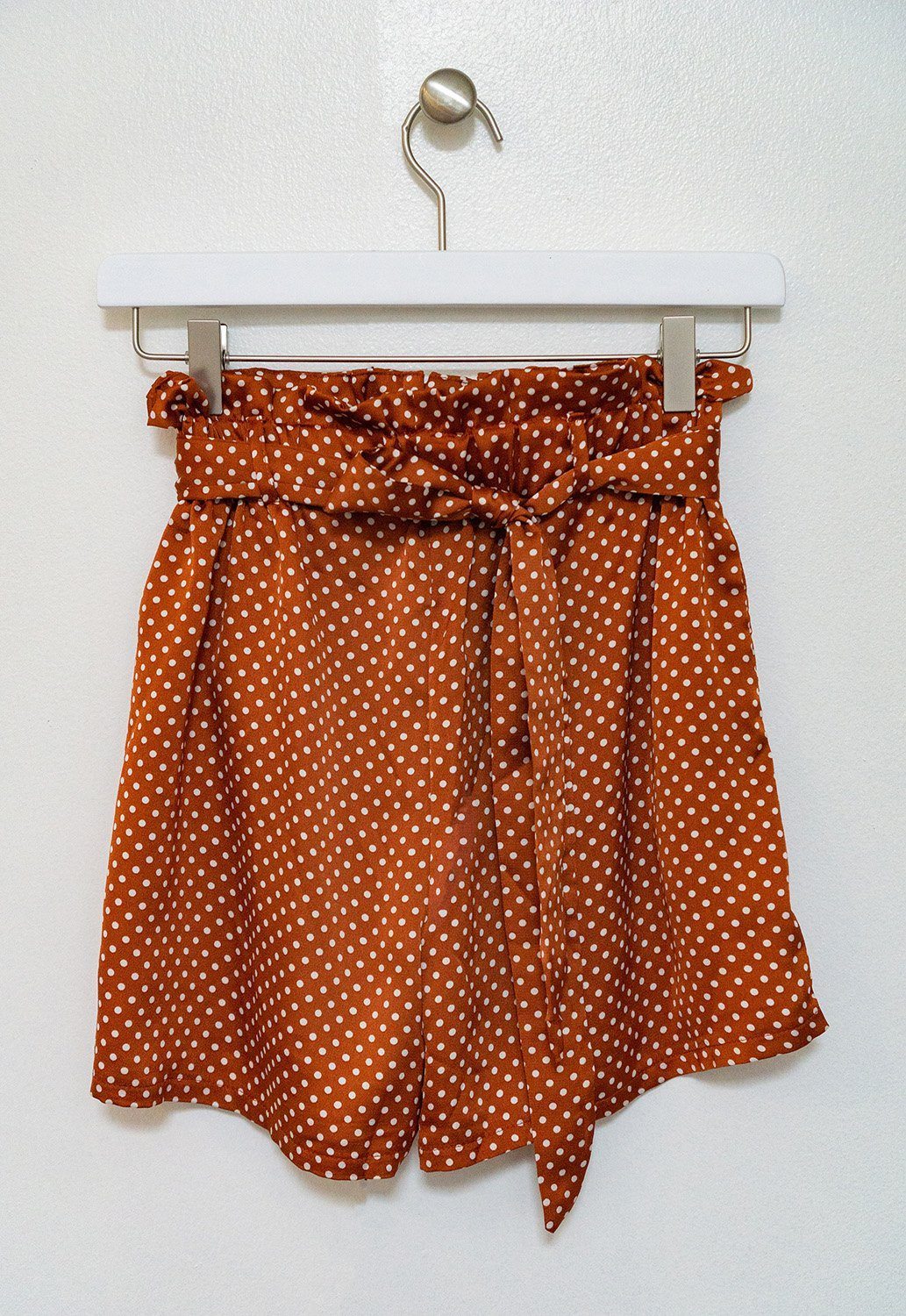 Azure Thanatos cloth patterned cinch waist shorts with a polka dot design, featuring a comfortable fit and stylish appearance.