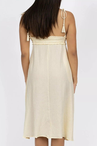 Cream pet costume resembling a midi dress with V-neck and spaghetti straps from Burgundy Perses for pets.