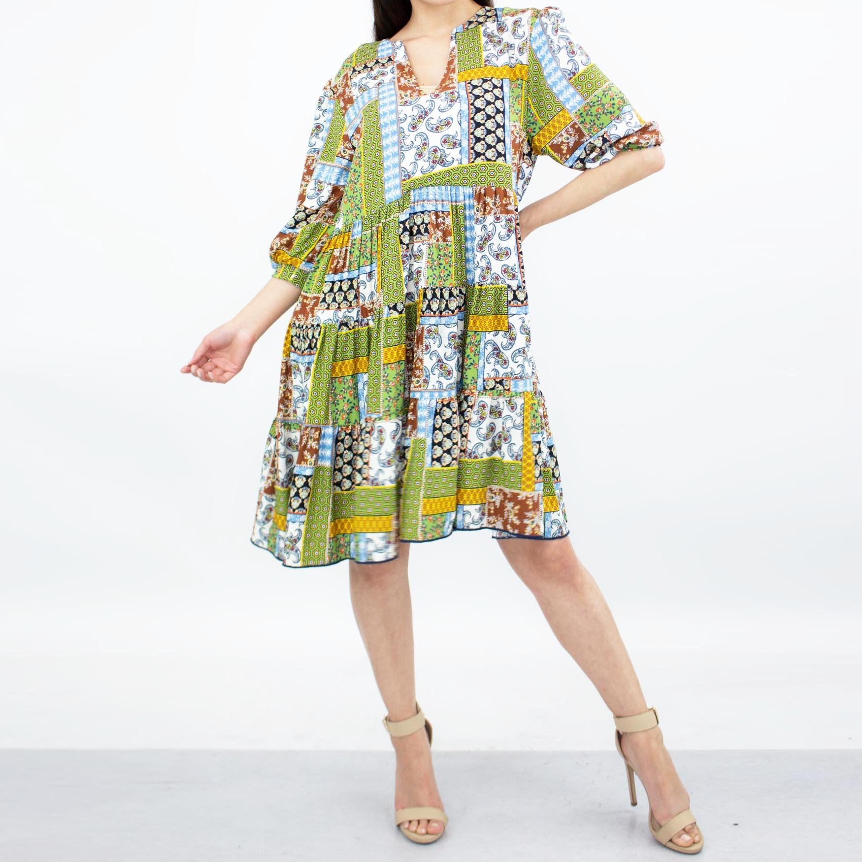 Green flare bottom 3/4 sleeve dress by Yellow Hera, showcasing stylish casual clothing with a relaxed fit and elegant flare design.