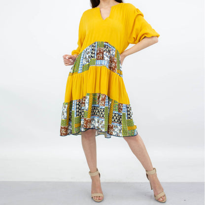 Yellow Hera three-tiered color block dress in yellow, featuring a stylish layered design and vibrant fabric.